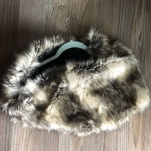 Over the shoulder faux cover that is perfect for a special event or night out.